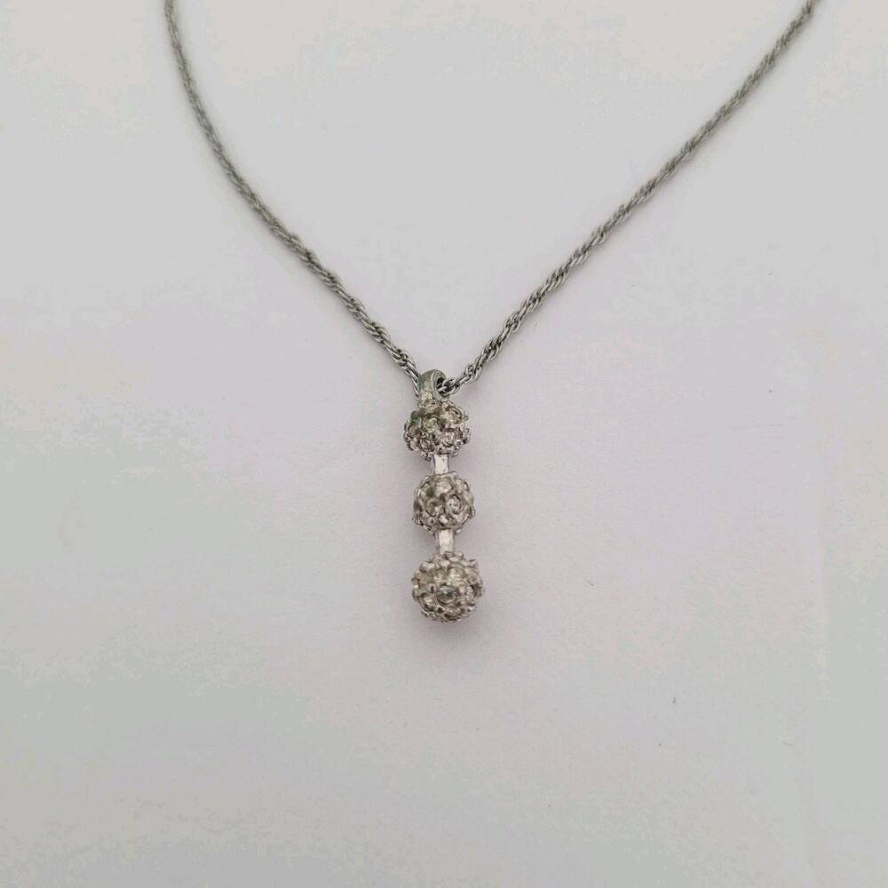 Nina Ricci Rhodium Plated Pendant with Swarovski Crystals - 16-18" length